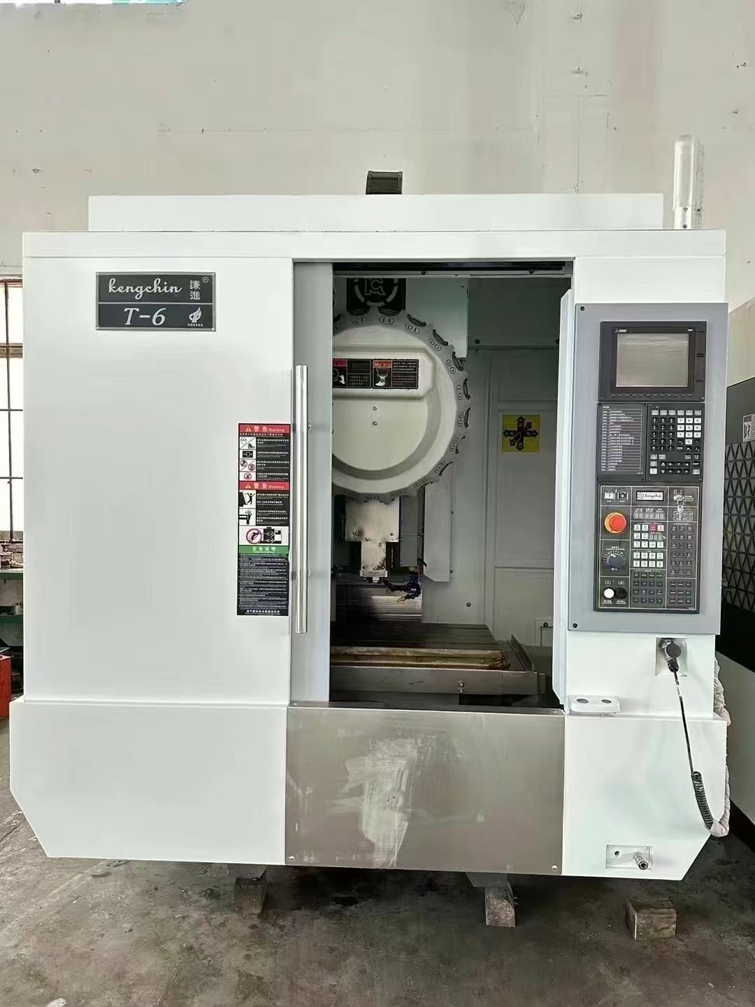 准新谦进T6钻攻中心机,2023年出厂,三菱M80-1