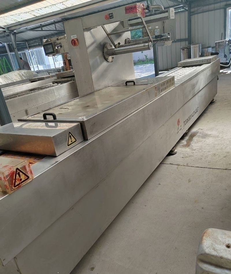 低价转让饵块糍粑拉伸膜真空包装机，正常运行，需要的-1