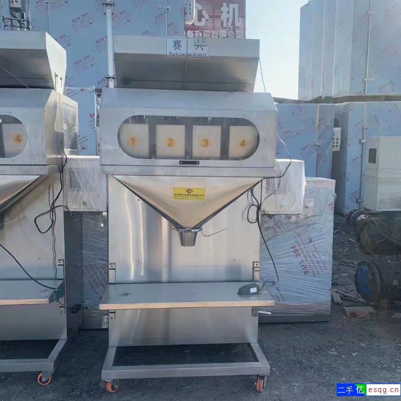 出售9成新4头半自动定量包装机 配套提升机-1
