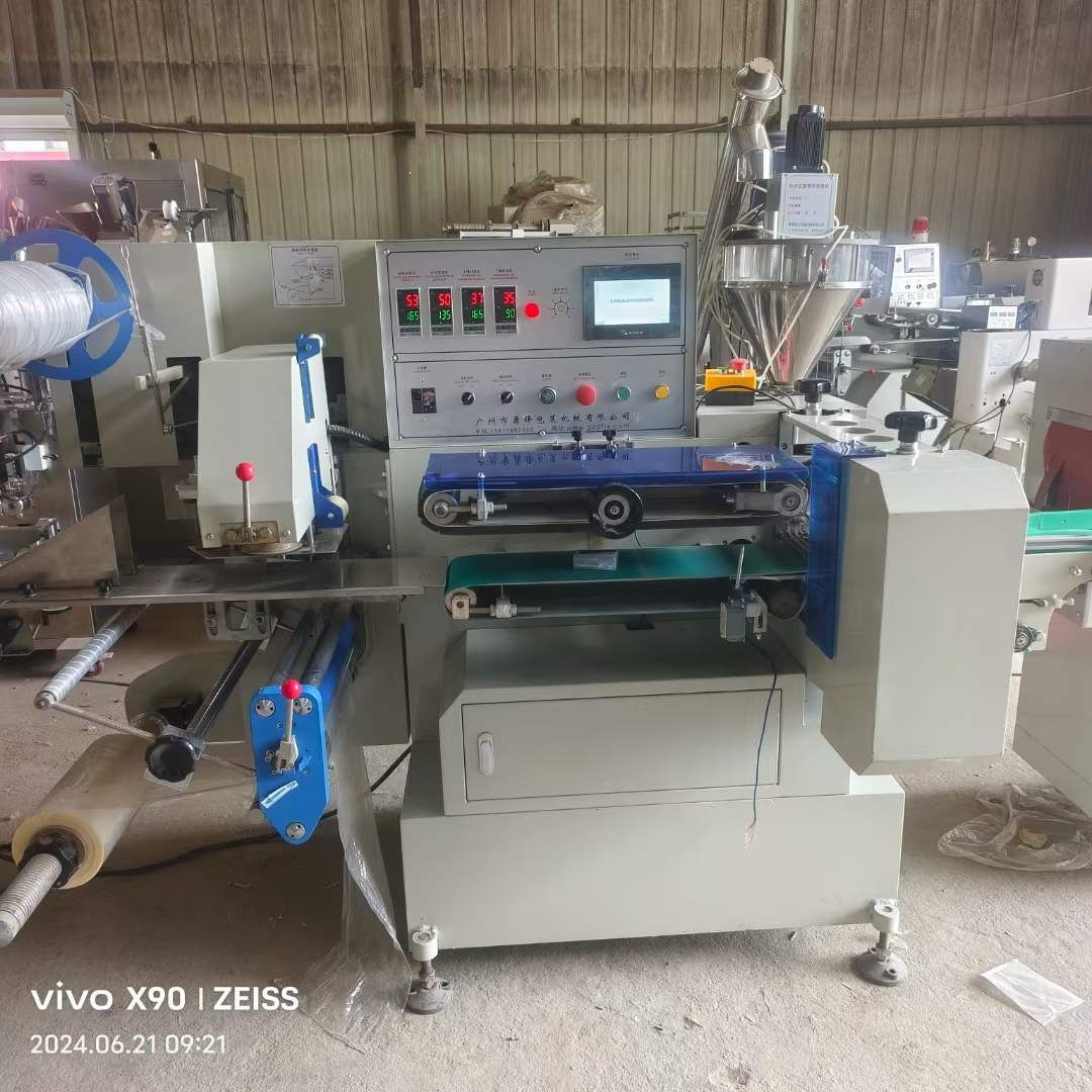 转让一台九成九新590枕式热缩膜自动包装机，全伺服-2