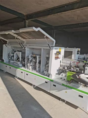 出售二手广东冷压机 四面刨 开料机 跟踪