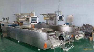 客户转让九九新420饵块糍粑拉伸膜真空包