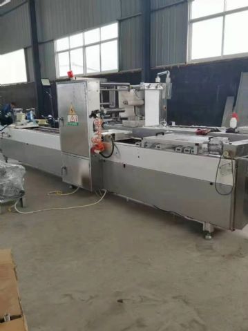 九九新二手420枣夹核桃拉伸膜真空包装机