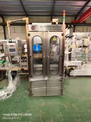 转让9成新广州理鑫套标机，饮料矿泉水套标