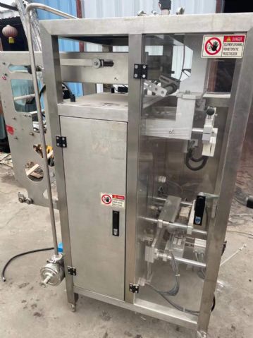 转让二手液体包装机 一台夹拉式立式液体包