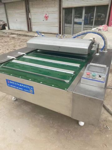 低价出售 1000型滚动式真空包装机20